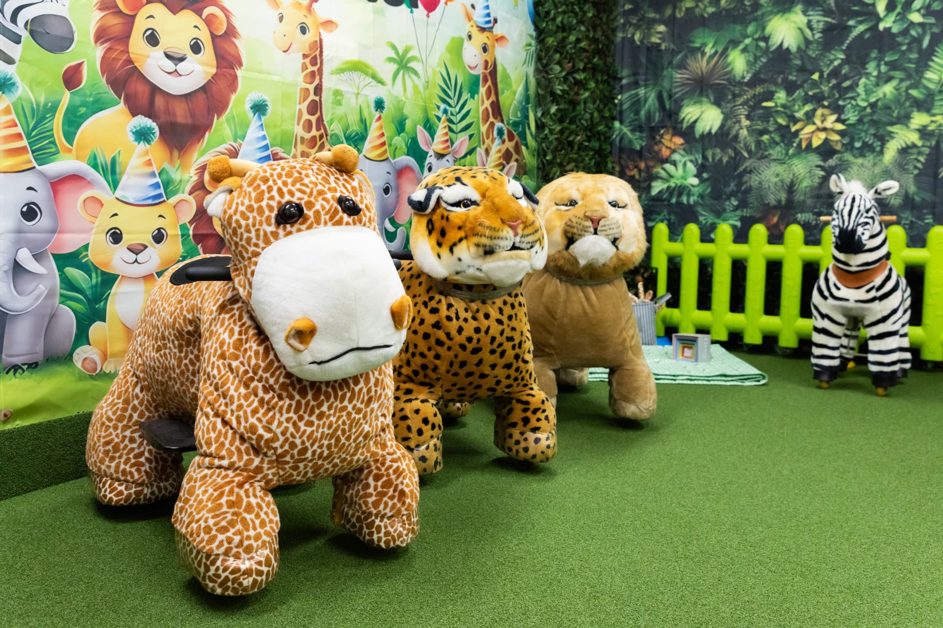 Motorised safari animals lined up in the Jungle Room